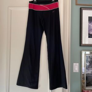 Flare athletic Nike leggings with red waistband stripe